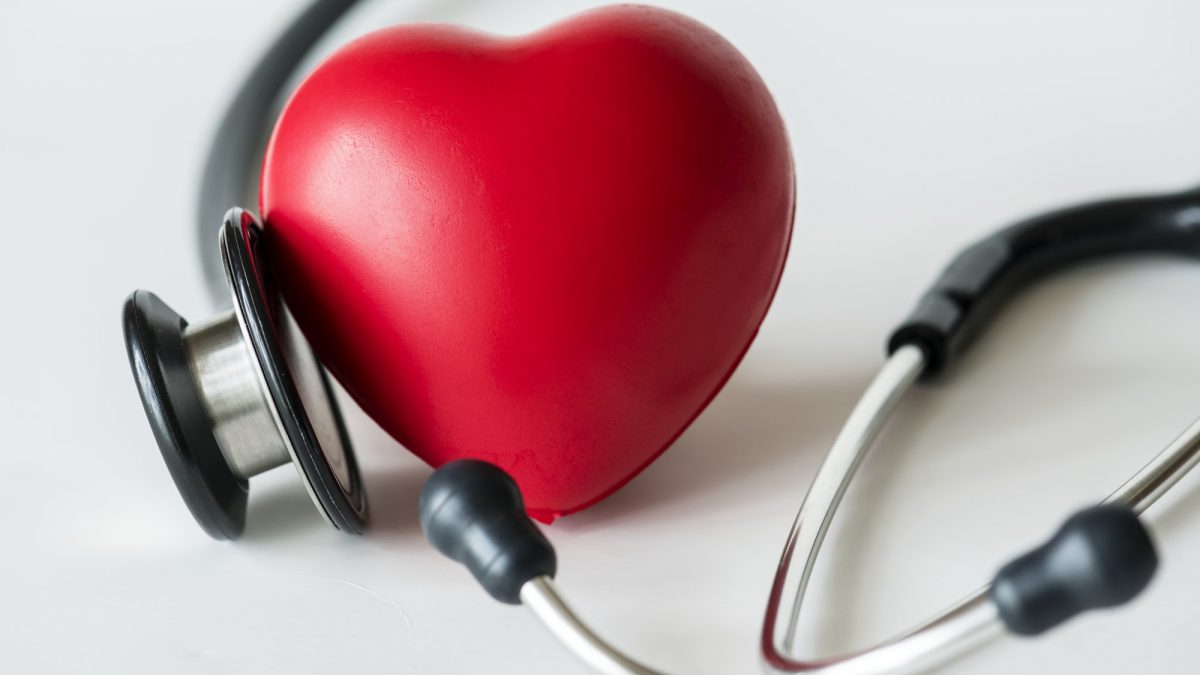 Closeup of heart and a stethoscope cardiovascular checkup concept