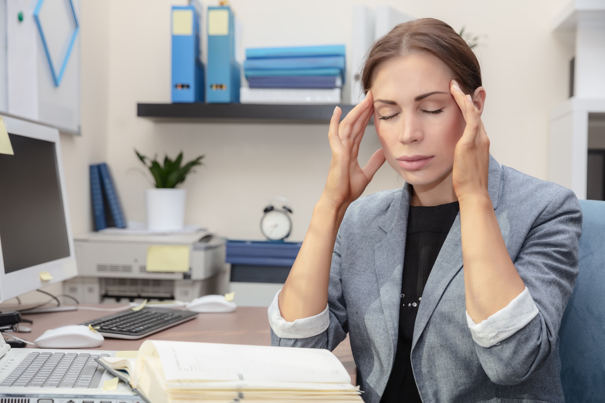 Tired woman at work